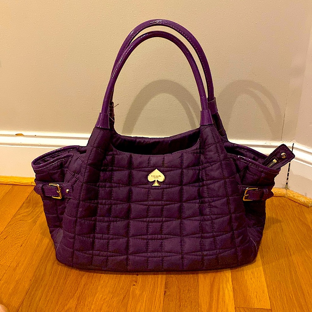 Kate Spade large shoulder purse. Purple. Used in good condition.